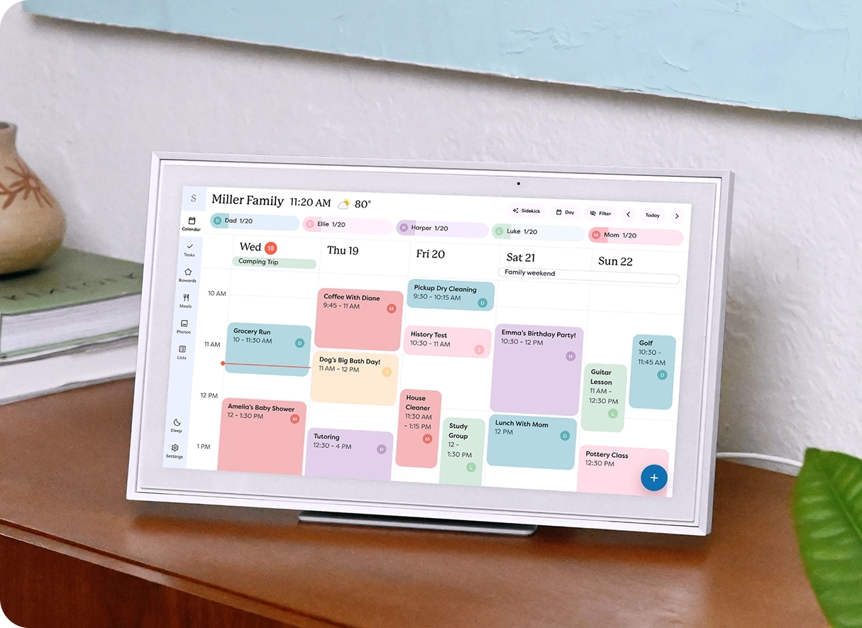 Skylight Calendar 15" on a countertop with a plant and bookcase in the background