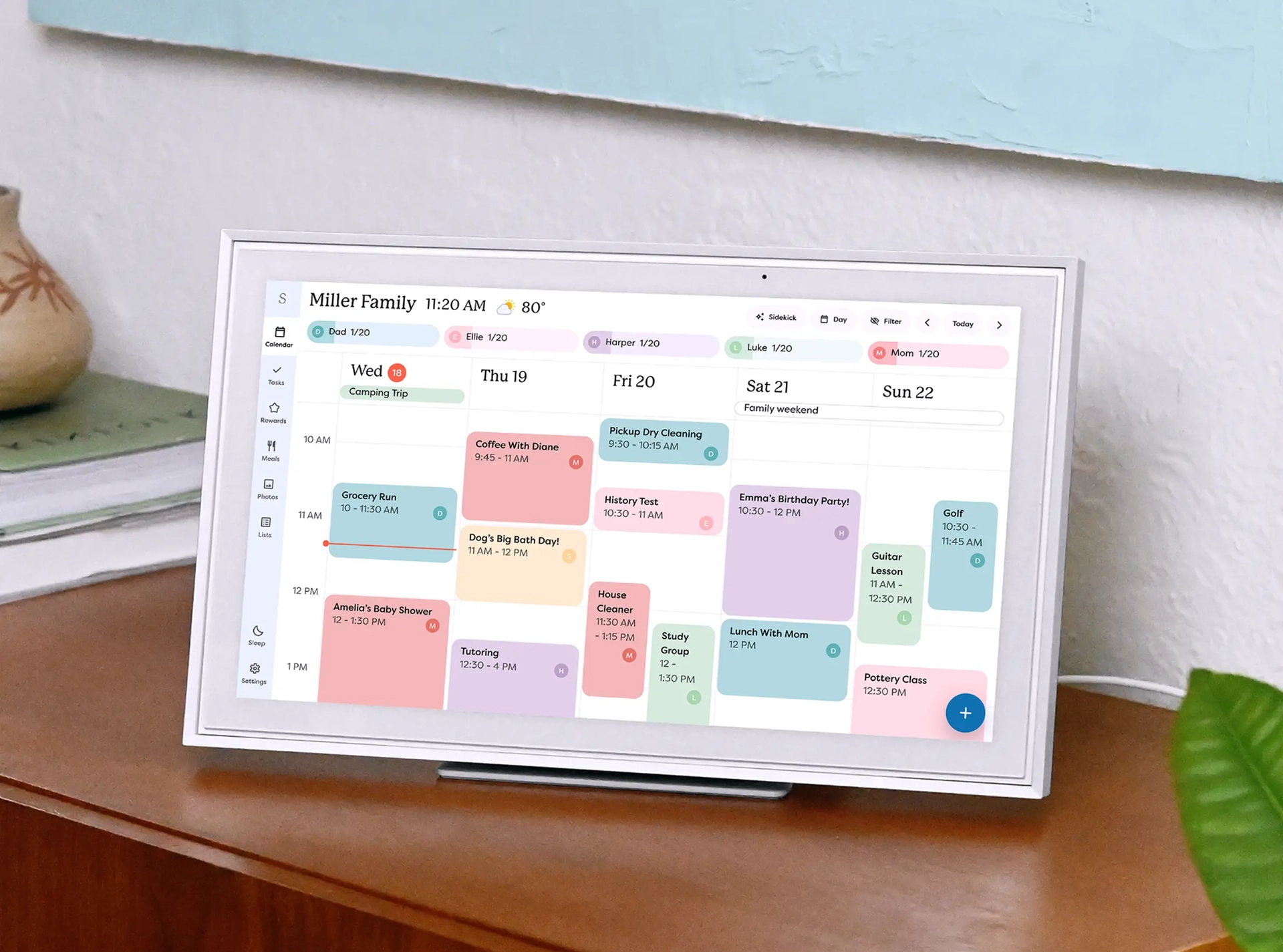 Skylight Calendar 15" on a countertop with a plant and bookcase in the background